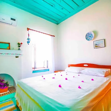 House With Blue Balcony