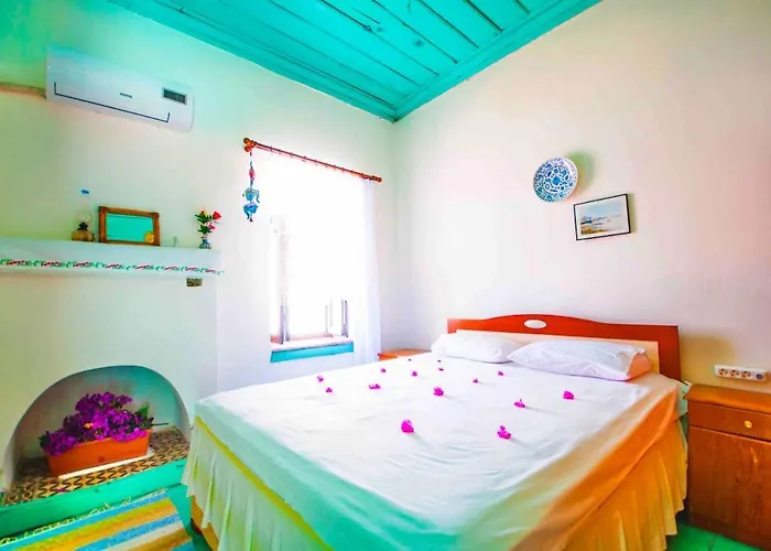 House With Blue Balcony